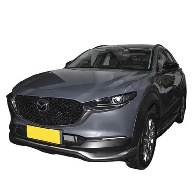 Goede prijs. 450 km bereik Mazda CX 30 EV elektrische auto in wit/blauw/rood/platina staal grijs/extreme grijs met van Mazda online